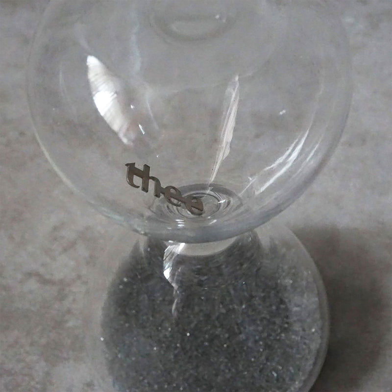 30 seconds mini hourglass by THEE on palm